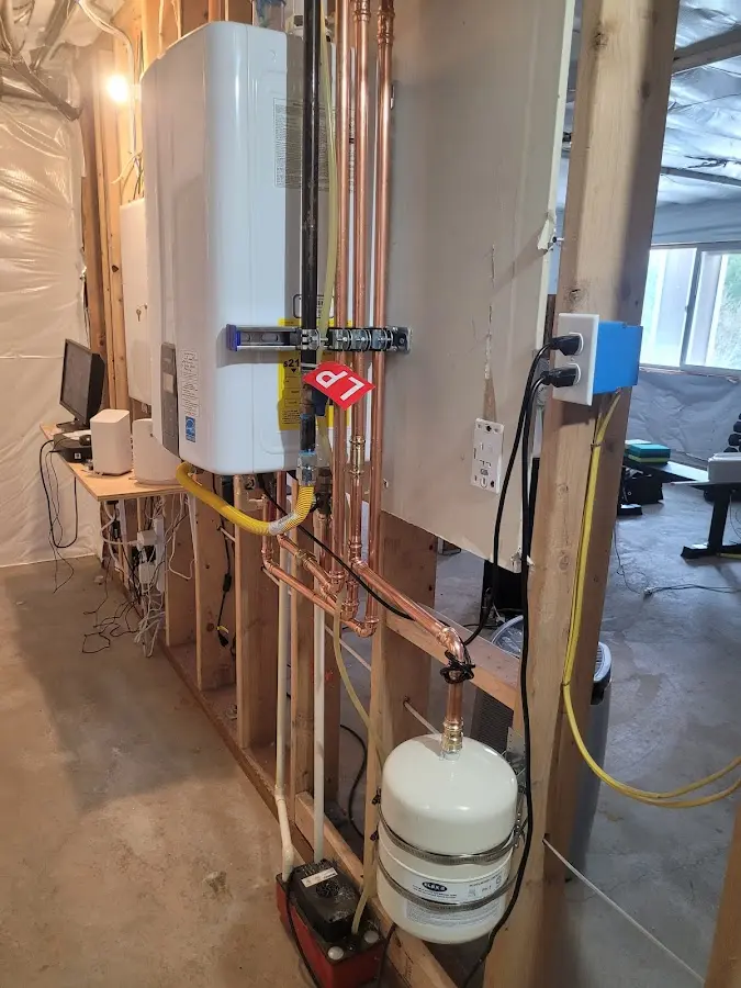 Licensed plumber repairing a kitchen sink in Makawao